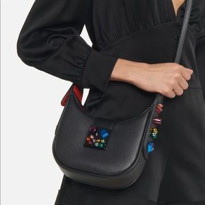 SALE! CHRISTIAN LOUBOUTIN
Carasky Mini embellished leather shoulder bag